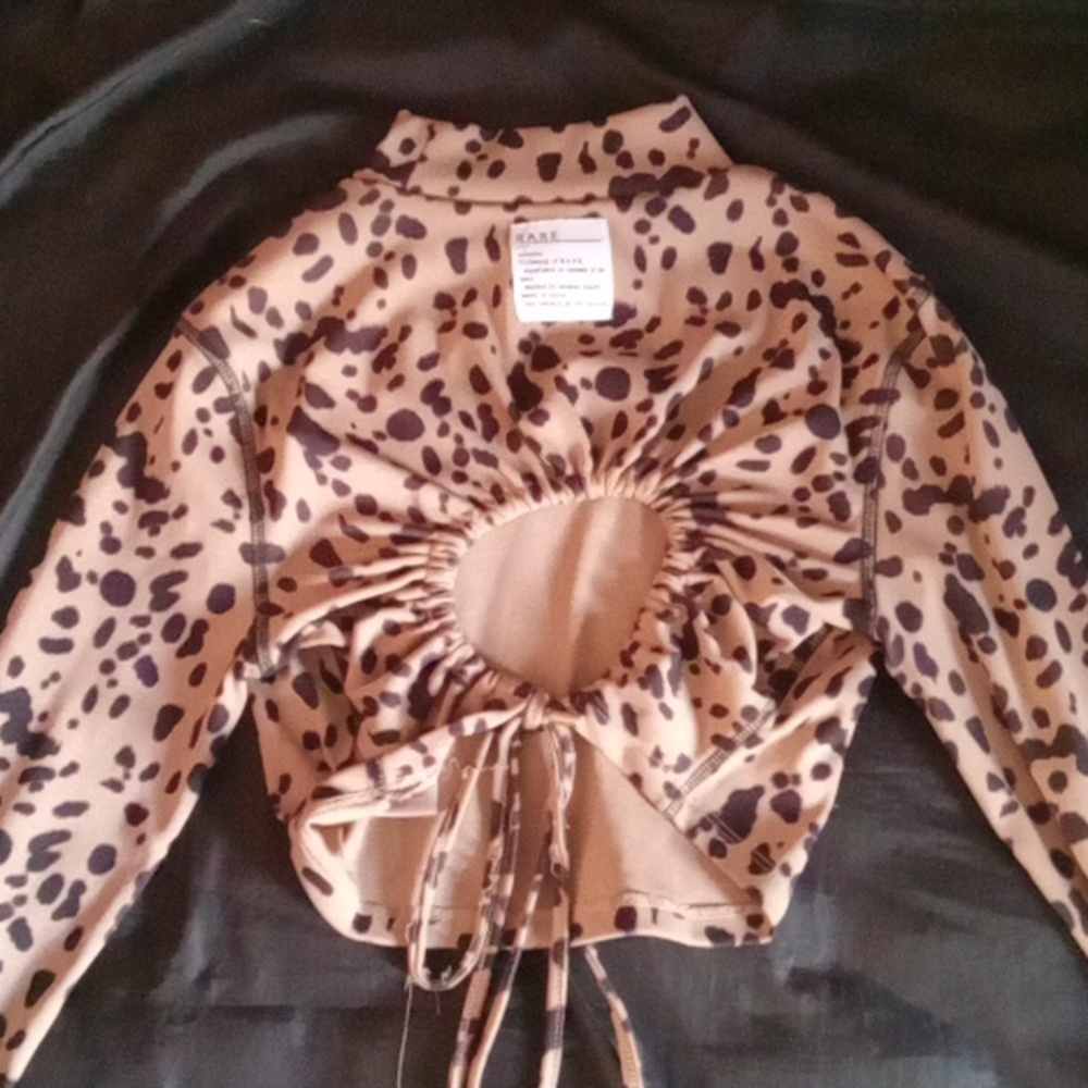 a cheetah(?) printed crop top!